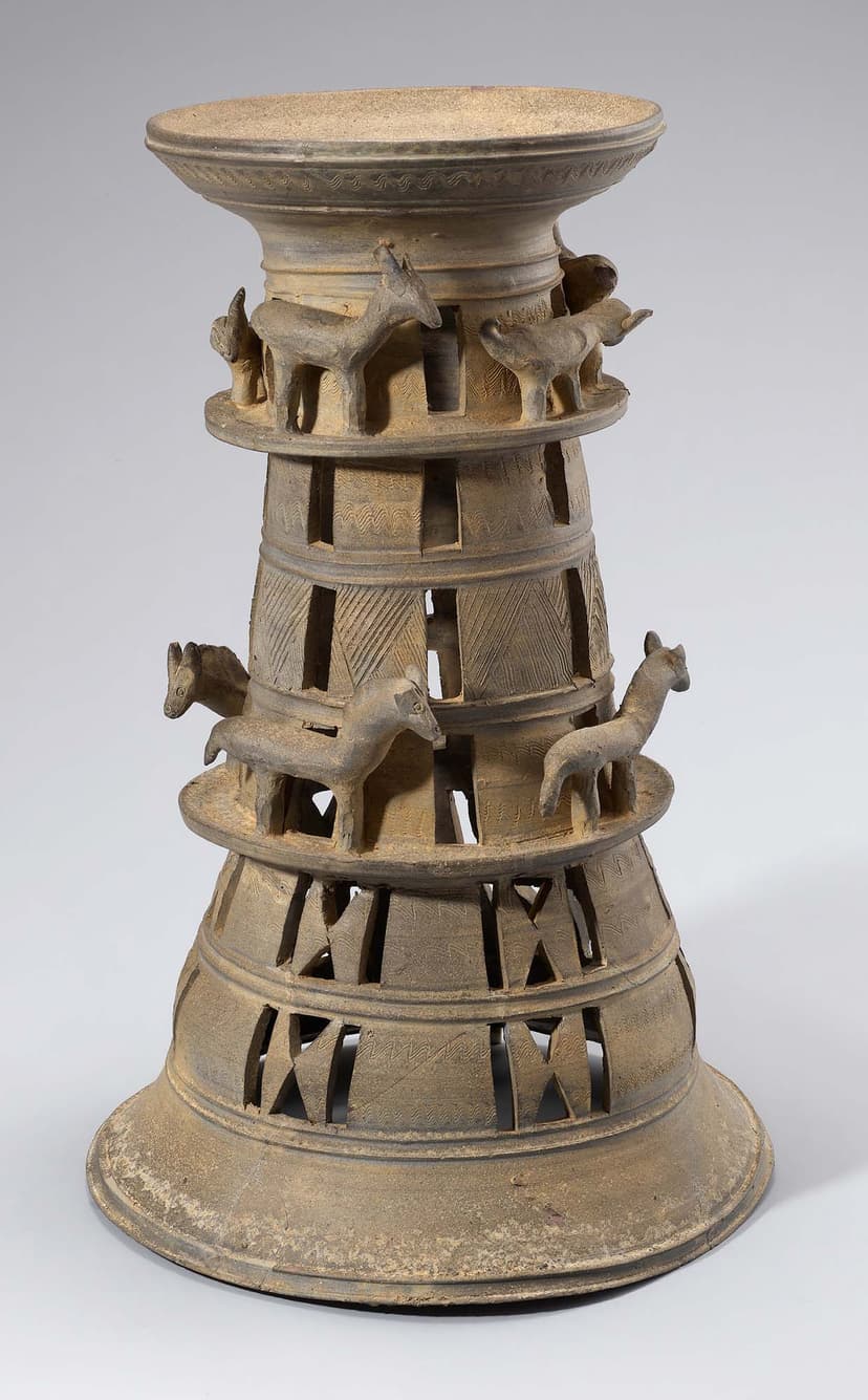 Pedestal with animal figurines