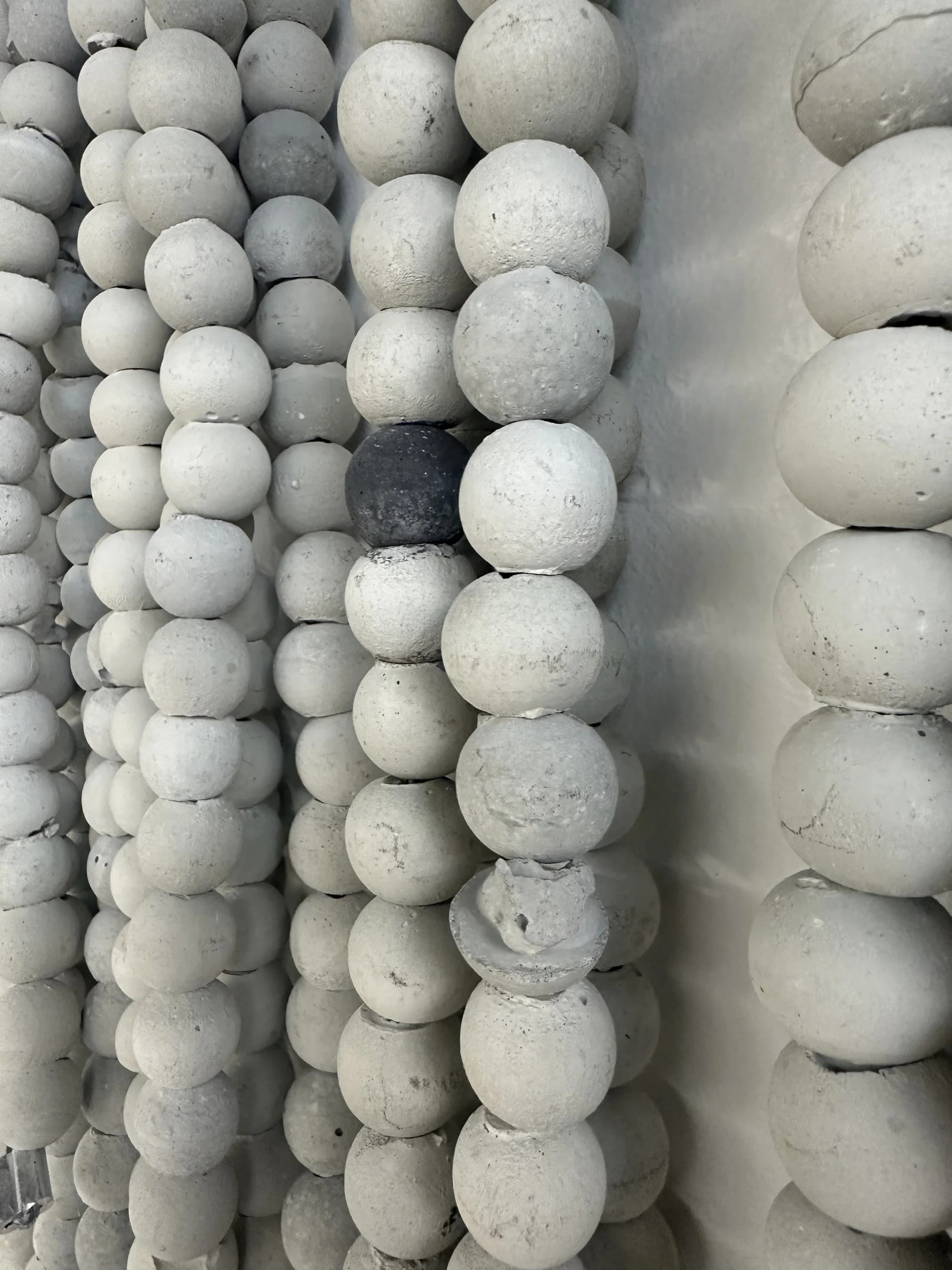 Luna Palazzolo-Daboul, hand-cast cement beads (detail), Of Ivory & Flesh, Primary, Miami, 2026