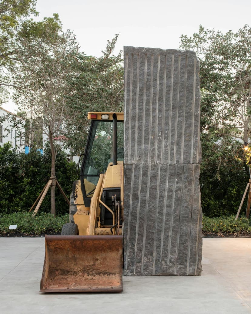 Allora & Calzadilla, Unspecified Promise, 2017, American black granite, 1993 Caterpillar 416 Series loader backhoe. Collection of Institute of Contemporary Art, Miami. Installed in the ICA Miami Sculpture Garden